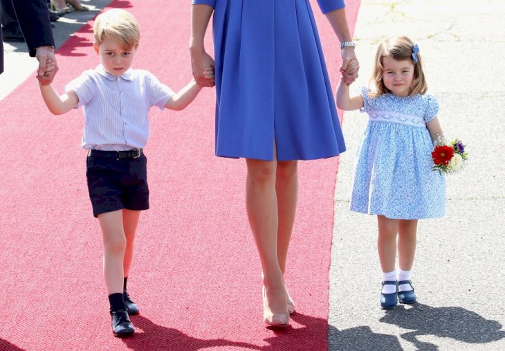 Image Credit: Getty Images / Prince William, Duke of Cambridge, Catherine, Duchess of Cambridge, Prince George of Cambridge and Princess Charlotte of Cambridge arrive at Berlin Tegel Airport.