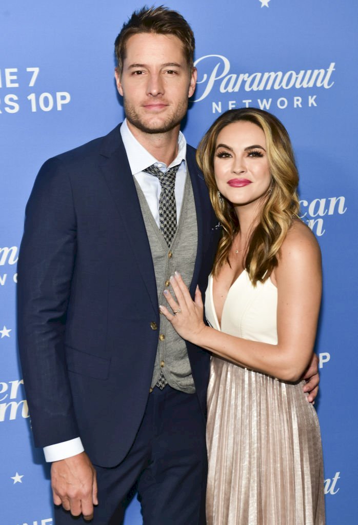 Image Credit: Getty Images / Actors, Chrishell Stause and Justin Hartley at an event.