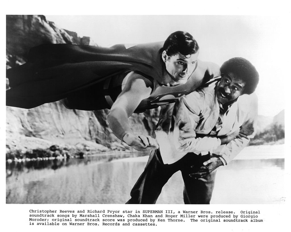 Image Credits: Getty Images / Michael Ochs Archives | Christopher Reeve and Richard Pryor in a scene from the Warner Bros. movie "Superman III, 1983