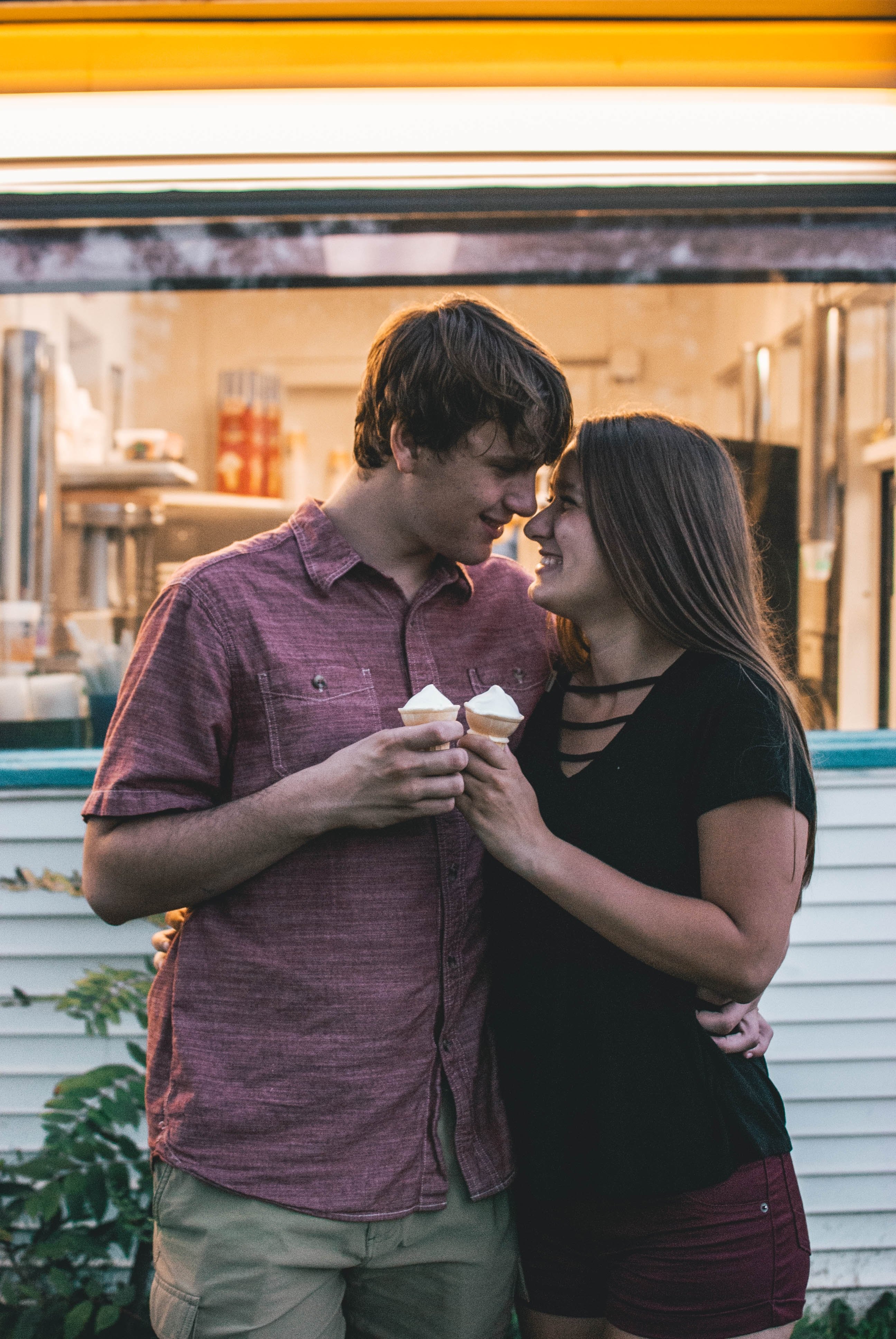 Couple enjoying ice cream together | Unsplash