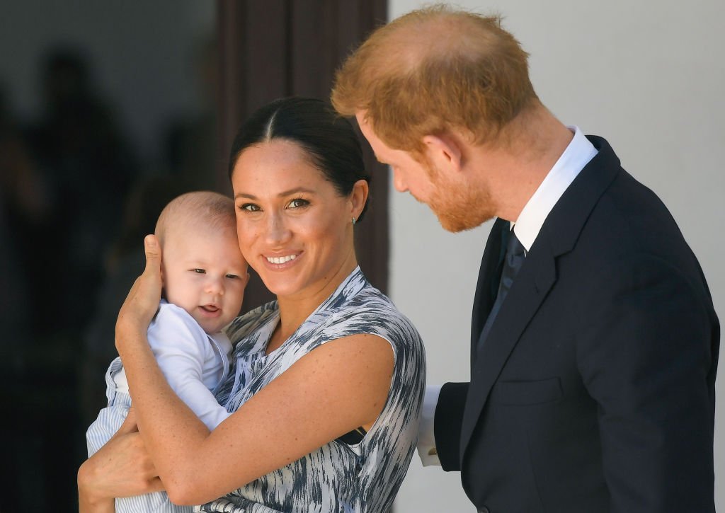 Image Source: Getty Images/Prince Harry and Meghan Markle with their child