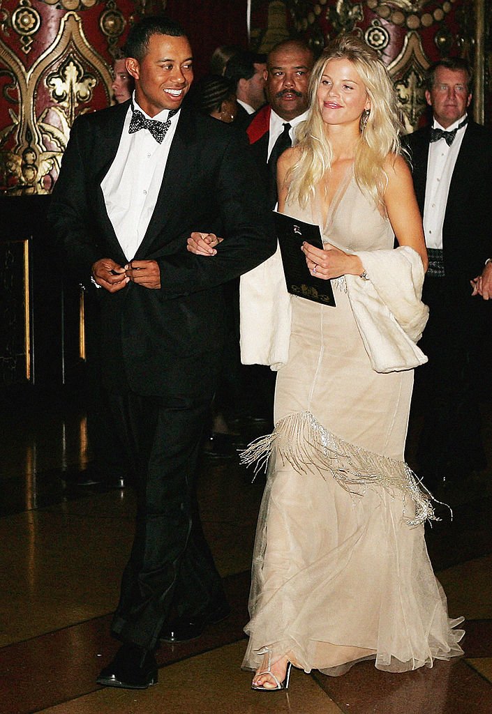 Image Credits: Getty Images / Andrew Redington | Tiger Woods and Elin Nordegren arrive at the 35th Ryder Cup Matches Gala Dinner at the Fox Theater on September, 15 2004 in Detroit, Michigan. Image Credits: Getty Images / Andrew Redington | Tiger Woods and Elin Nordegren arrive at the 35th Ryder Cup Matches Gala Dinner at the Fox Theater on September, 15 2004 in Detroit, Michigan.