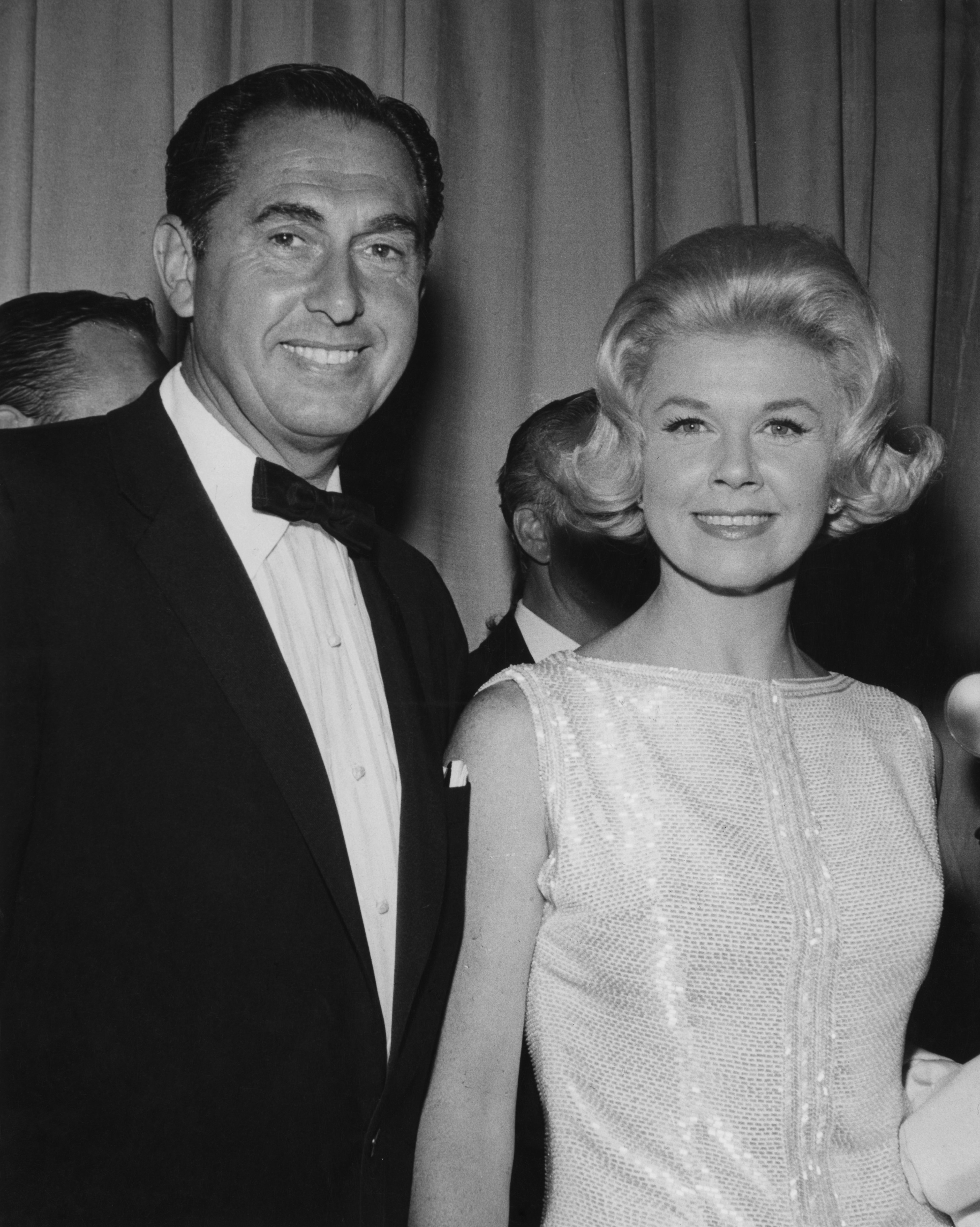 Image Credits: Getty Images / Darlene Hammond / Archive Photos | Actress and singer Doris Day and her husband Martin Melcher (1915 - 1968) attend an Academy Awards party held at the Beverly Hilton Hotel in Hollywood, California, 4th April 1960.