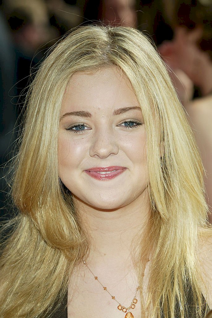 Image Credits: Getty Images / Frederick M. Brown | Actress Madylin Sweeten arrives at the 57th Annual Emmy Awards.