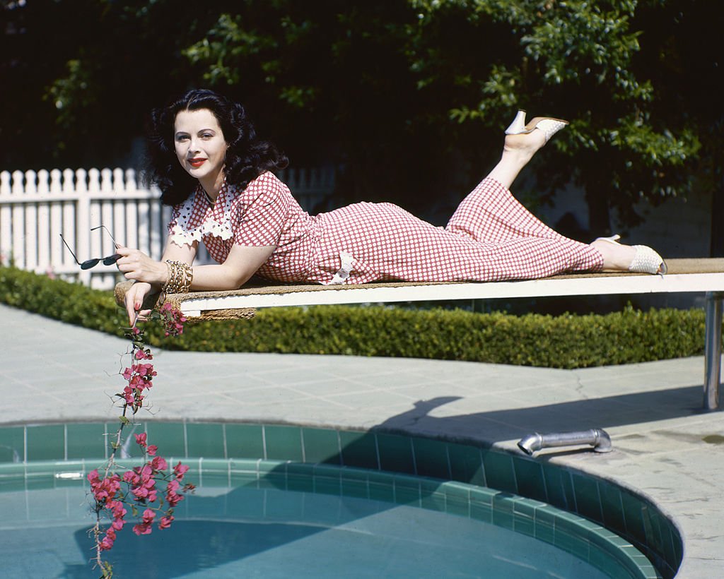 Image Credit: Getty Images / Austrian actress on a diving board over the water of a swimming pool against velour-covered surface, 1945. Image Credit: Getty Images / Austrian actress on a diving board over the water of a swimming pool against velour-covered surface, 1945.