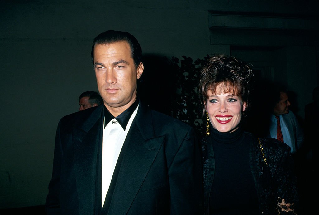Image Credits: Getty Images / Kevin Winter / DMI / The LIFE Picture Collection | Married actors Steven Seagal and Kelly LeBrock. Image Credits: Getty Images / Kevin Winter / DMI / The LIFE Picture Collection | Married actors Steven Seagal and Kelly LeBrock.