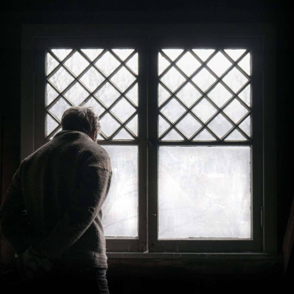Creepy man looking into my window | Shutterstock