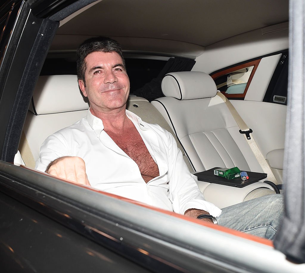 Image Credit: Getty Images / Simon Cowell seen leaving the Dorchester hotel after a day full of meetings and a special apperance at a charity event held at the hotel on April 1, 2014 in London, England.