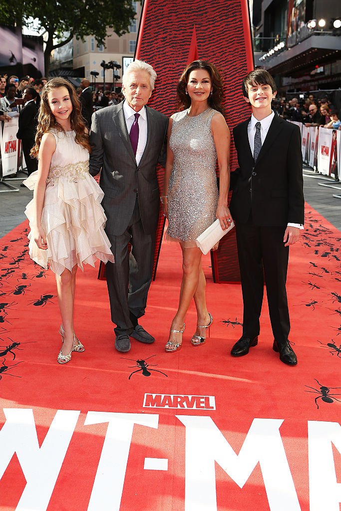 Image Credits: Getty Images / David M. Benett / Dave Benett / WireImage | (L-R) Carys Douglas, Michael Douglas, Catherine Zeta Jones and Dylan Douglas attend the European Premiere of Marvel's "Ant-Man" at Odeon Leicester Square on July 8, 2015 in London, England.