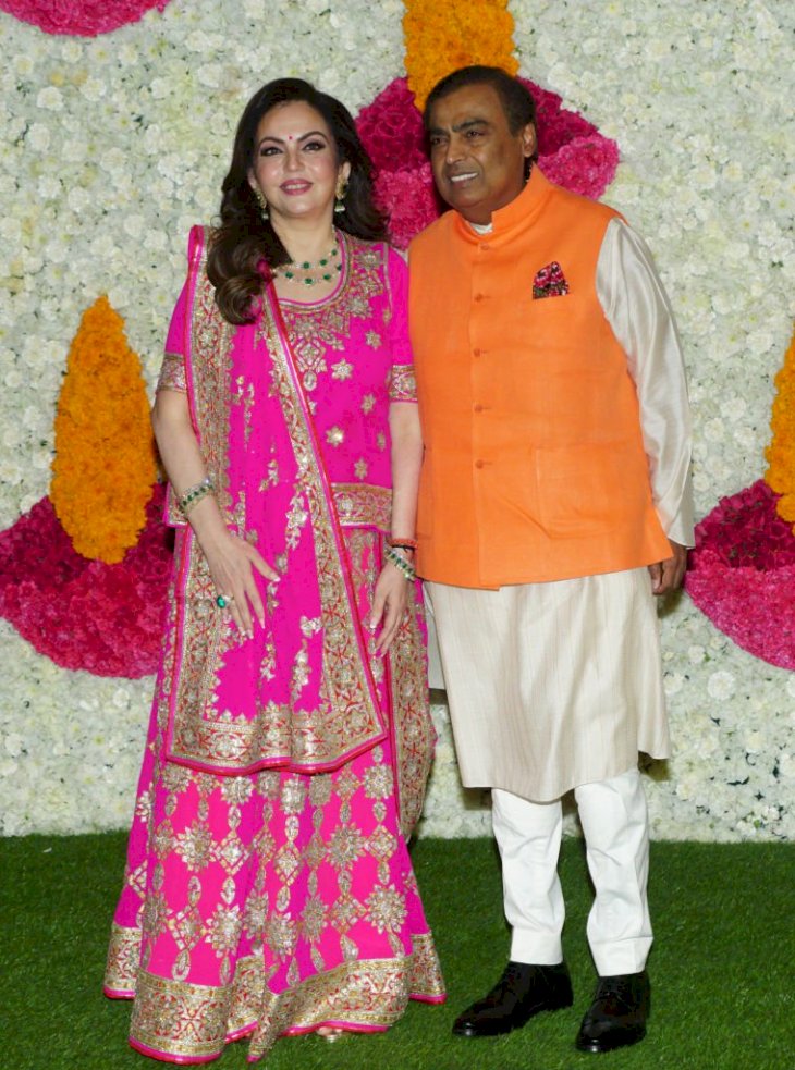 Image Credits: Getty Images / Prodip Guha | Mukesh Ambani and his wife Nita Ambani.