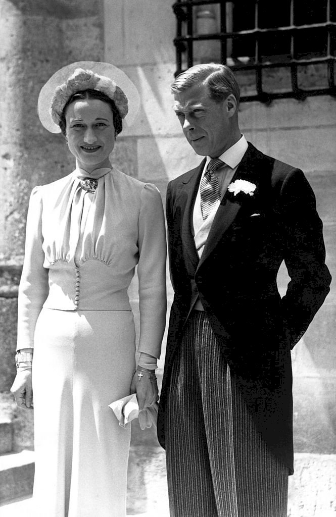 Image Credits: Getty Images / Mondadori | Edward VIII and Wallis Simpson posing at the Castle of Conde on their wedding day.