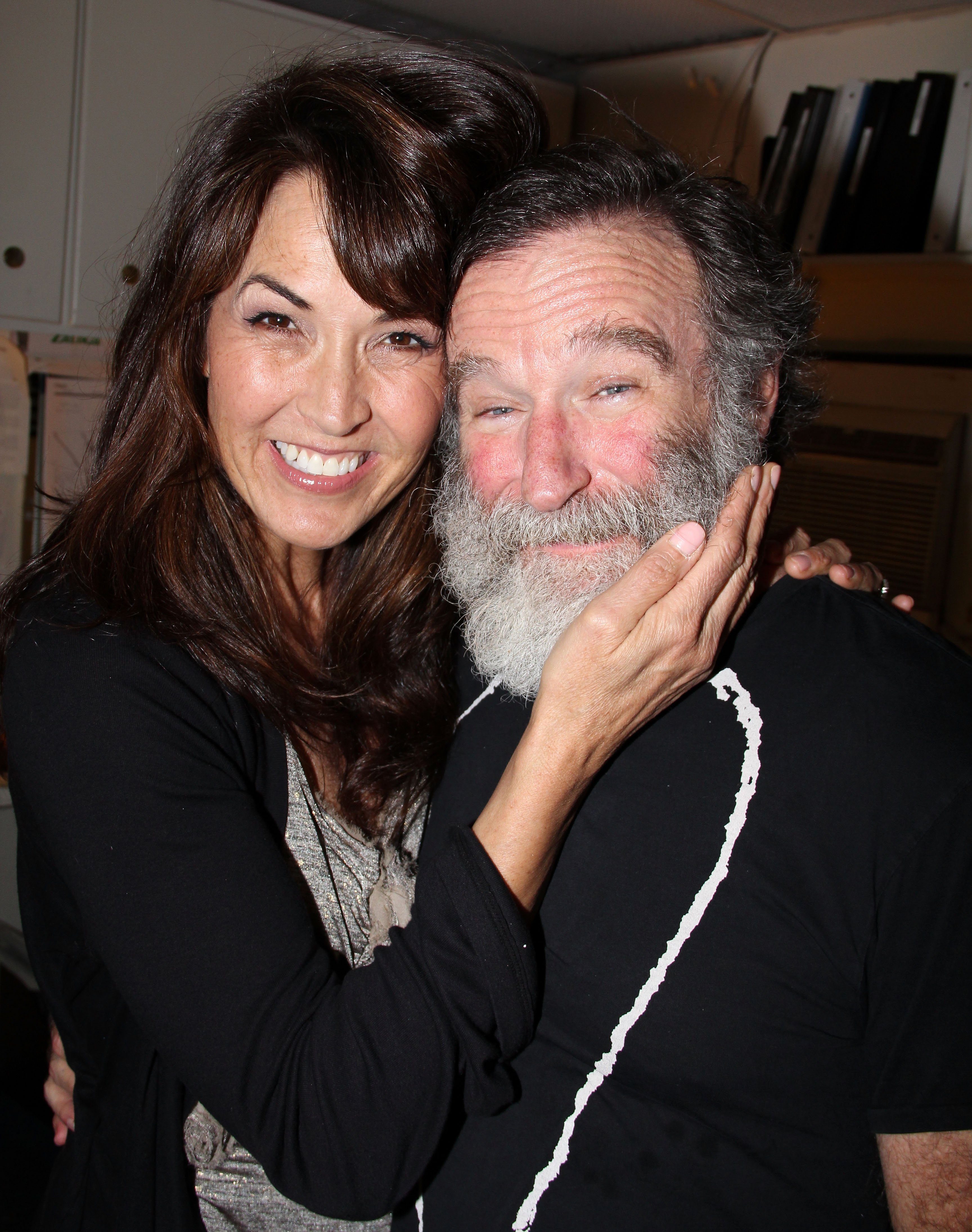 Image Credits: Getty Images / Bruce Glikas / FilmMagic | Susan Schneider and fiancee Robin Williams pose backstage at the hit play "Bengal Tiger at The Baghdad Zoo" on Broadway at The Richard Rogers Theater on June 15, 2011 in New York City. Image Credits: Getty Images / Bruce Glikas / FilmMagic | Susan Schneider and fiancee Robin Williams pose backstage at the hit play "Bengal Tiger at The Baghdad Zoo" on Broadway at The Richard Rogers Theater on June 15, 2011 in New York City.