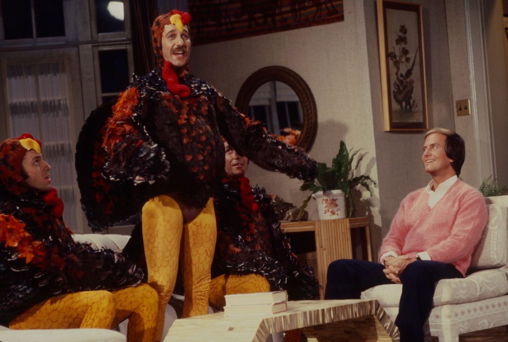 Image Credits: Getty Images / Walt Disney Television | Brett Hudson, Mark Hudson, Bill Hudson, the Hudson Brothers dressed as turkeys, Pat Boone appearing on the ABC tv special 'Pat Boone and Family Thanksgiving Special'.