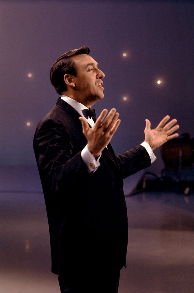 Image Source: Getty Images/Martin Mills| Actor and singer Jim Nabors performs during an act circa 1970