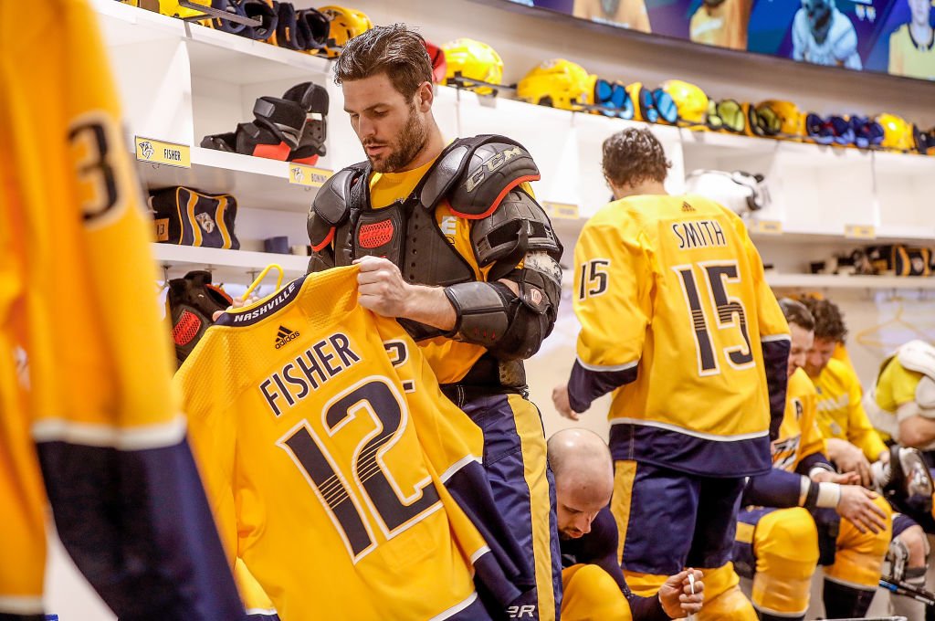 Image Credit: Getty Images / Mike Fisher #12 of the Nashville Predators skates against the Buffalo Sabres in his 1100th career NHL game on March 31, 2018 at Bridgestone Arena in Nashville.