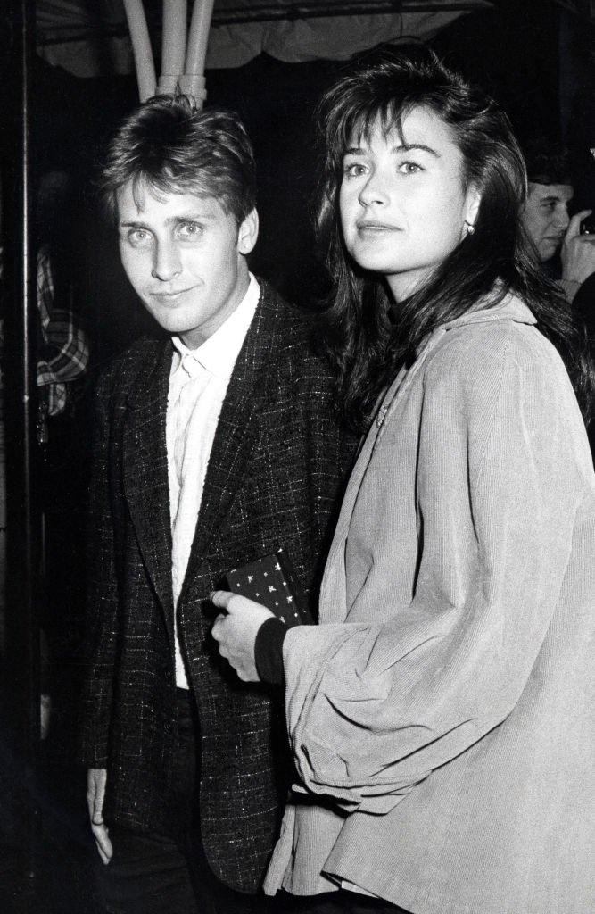 Image Credits: Getty Images / Ron Galella / Ron Galella Collection | Emilio Estevez and Demi Moore during "Pretty In Pink" Los Angleles Premiere at Mann's Chinese Theater in Hollywood, California, United States.