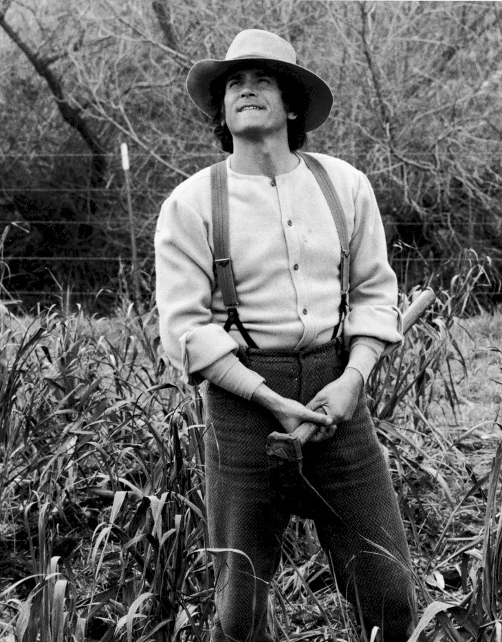 Image Credit: Getty Images/NBC Television | Michael Landon (1936 - 1991) stands in a field in a still from the television series, 'The Little House On The Prairie,' circa 1976.