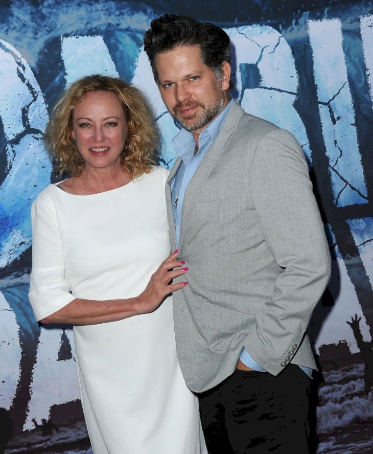 Image Credit: Getty Images/Albert L. Ortega |Virginia Madsen and Nick Holmes arrive for the Premiere Of SyFy's "Zombie Tidal Wave"