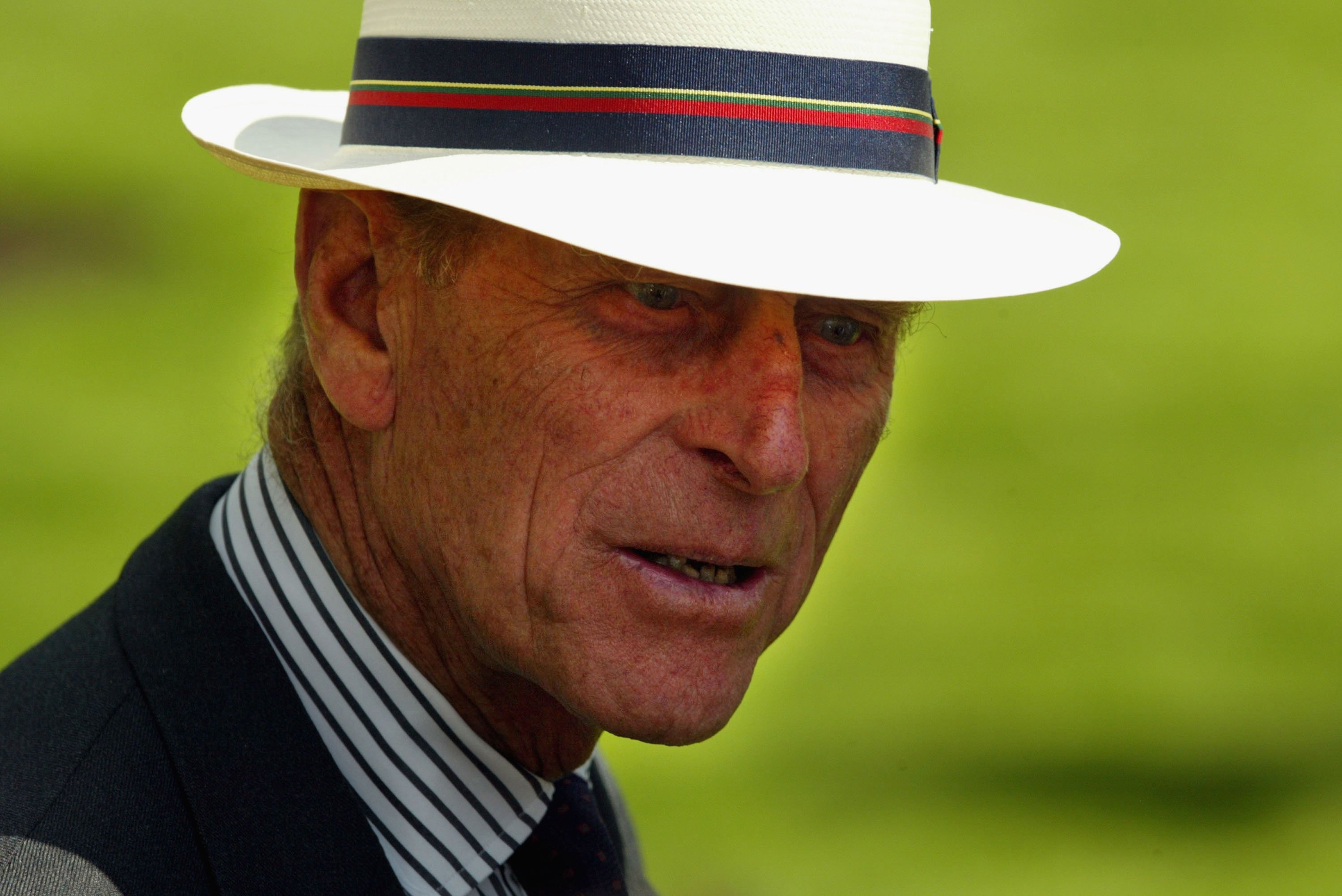 Image Source: Getty Images/ Prince Philip outside with a hat