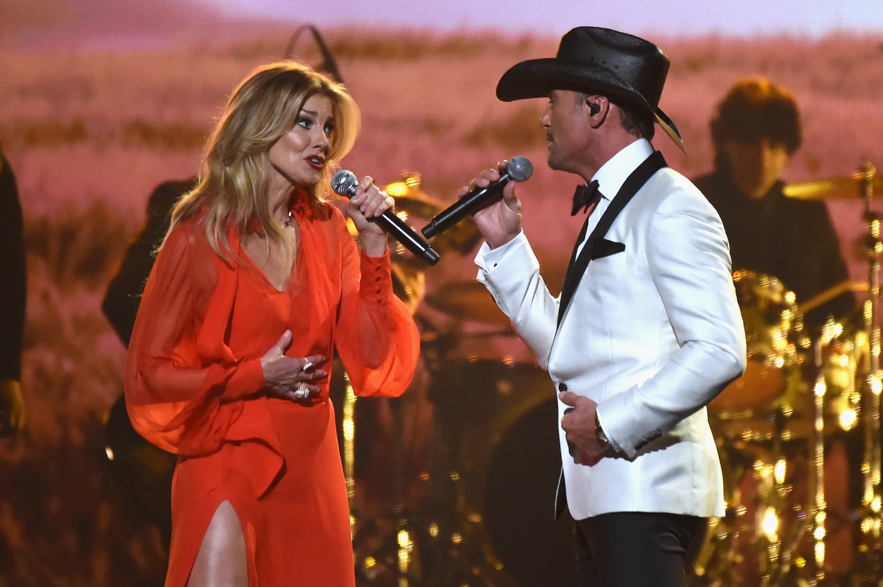Image Credits: Getty Images / Rick Diamond | Faith Hill and Tim McGraw perform onstage at the 51st annual CMA Awards at the Bridgestone Arena on November 8, 2017 in Nashville, Tennessee. Image Credits: Getty Images / Rick Diamond | Faith Hill and Tim McGraw perform onstage at the 51st annual CMA Awards at the Bridgestone Arena on November 8, 2017 in Nashville, Tennessee.