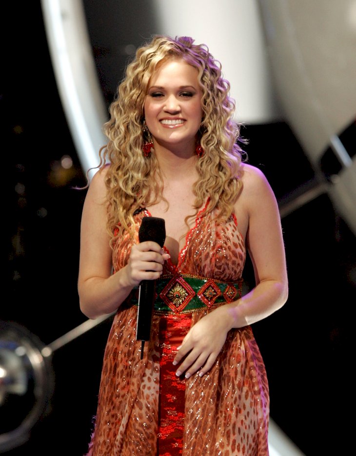 Image Source: Getty Images/Kevin Winter | Singer Carrie Underwood at the finale of American Idol Season 4