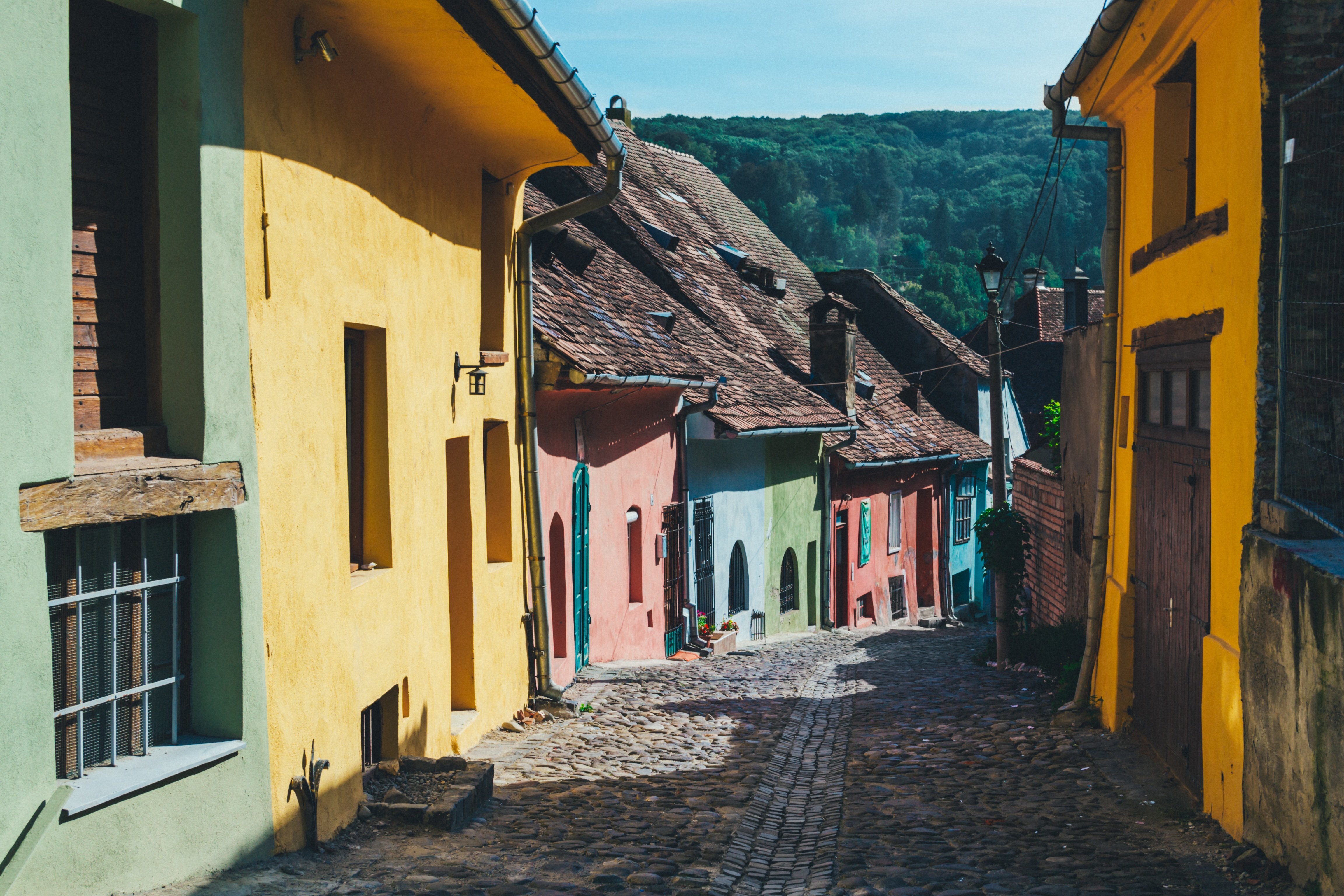 Mexican street lined with houses | Photo by freestocks.org on Unsplash