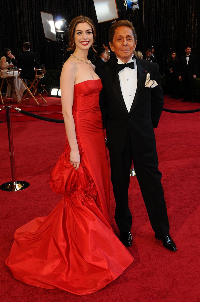Image Credits: Getty Images | Anne Hathaway with Valentino