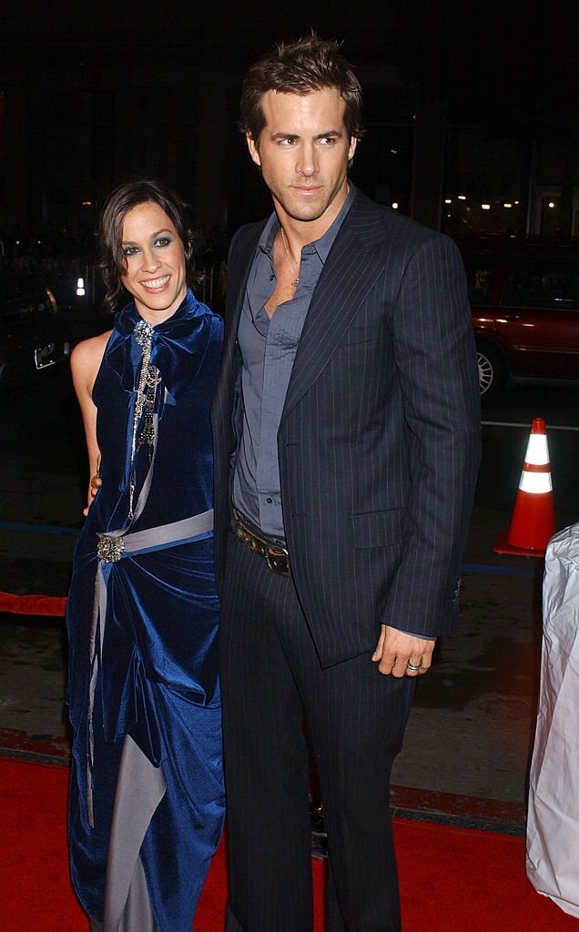 Image Source: Getty Images/Albert L. Ortega/Alanis Morissette and Ryan Reynolds during "Blade: Trinity" Los Angeles Premiere - Arrivals at Grauman's Chinese Theater in Hollywood, California