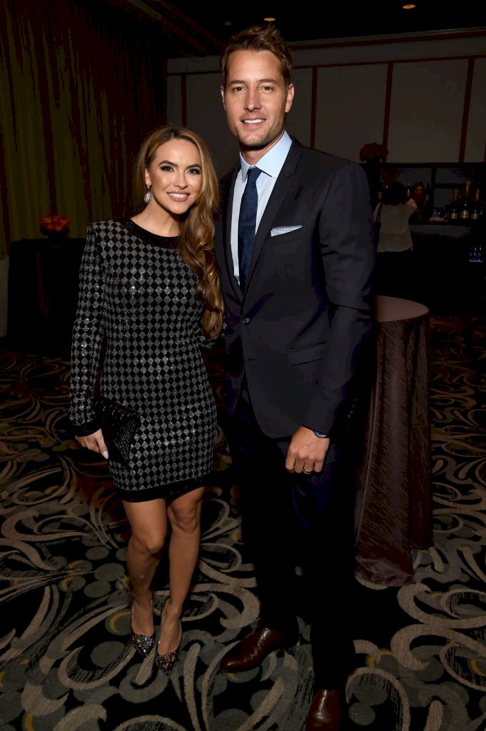 Image Credit: Getty Images / Actors, Chrishell Stause and Justin Hartley arrive at an event.