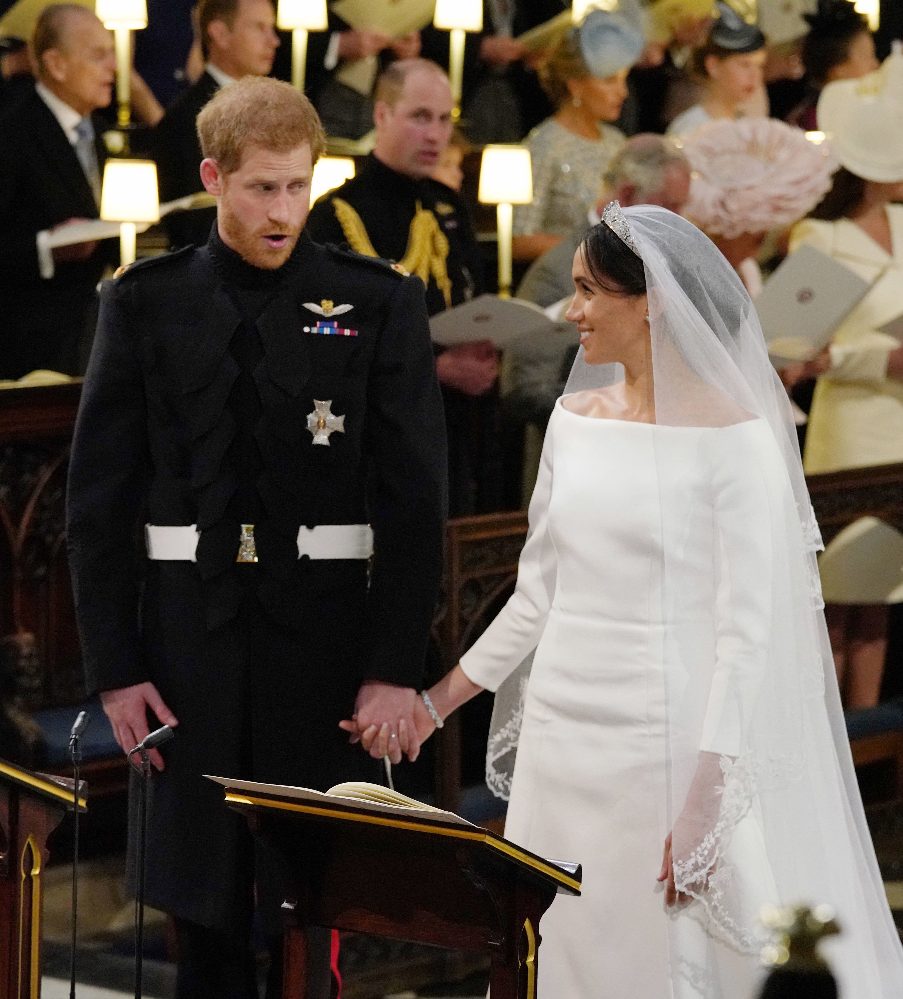 Image Source: Getty Images/Prince Harry and Meghan during their wedding