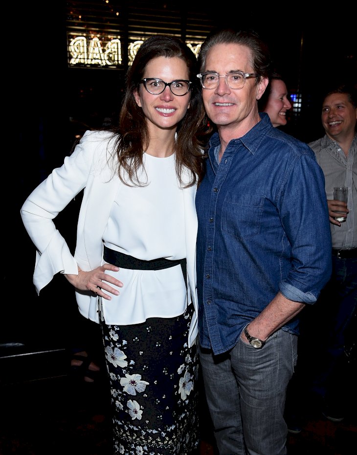 Image Credit: Getty Images/Dimitrios Kambouris | Desiree Gruber and Kyle MacLachlan attend the after party for A Screening Of "Impulse"