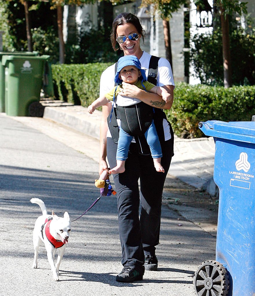 Image Credits: Getty Images / JB Lacroix / WireImage | Alanis Morissette and Ever Imre Morissette-Treadway are seen in Brentwood on August 23, 2011 in Los Angeles, California.