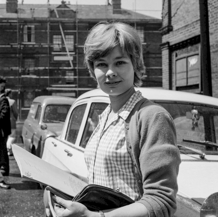 Image Credits: Getty Images / Jones / Evening Standard / Hulton Archive | Dame Judi Dench in July 1960.