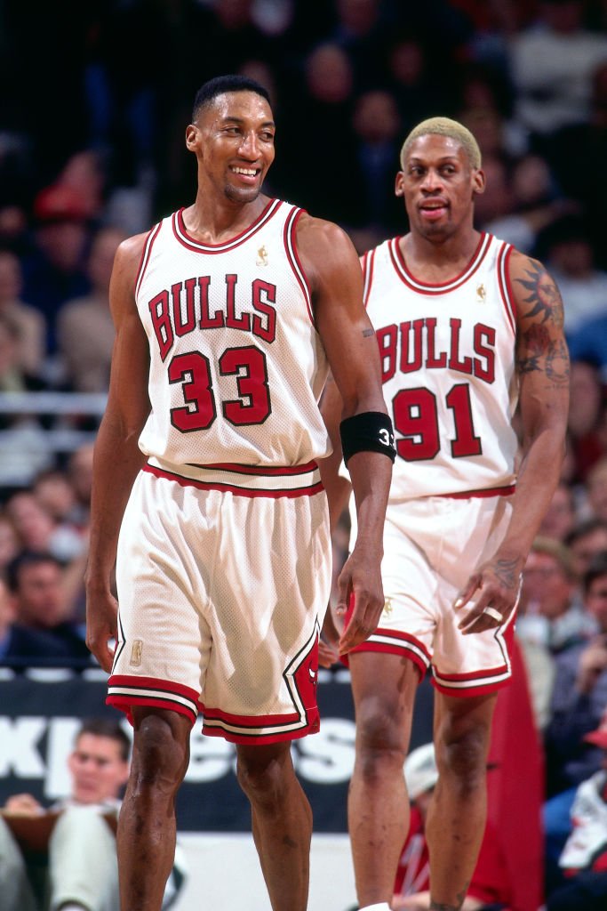 Image Credits: Getty Images / Sam Forencich / NBAE | Scottie Pippen #33, and Dennis Rodman #91 of the Chicago Bulls are seen during the game against the Portland Trail Blazers on February 24, 1997 at the United Center in Chicago, IL.