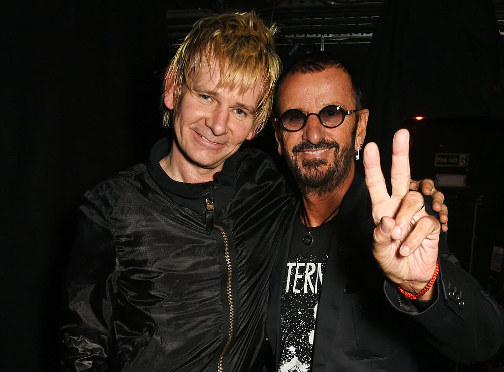 Image Credits: Getty Images / David M. Benett / Dave Benett | Zak Starkey (L) and father Ringo Starr attend the launch of "Issues", a new album by SSHH in aid of Teenage Cancer Trust, at The Box on September 5, 2016 in London, England.