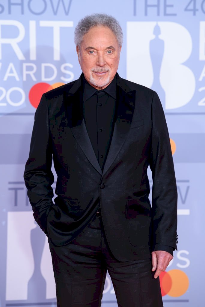 Image Credit: Getty Images/Getty Images for Bauer Media/Joe Maher | Tom Jones attends The BRIT Awards 2020