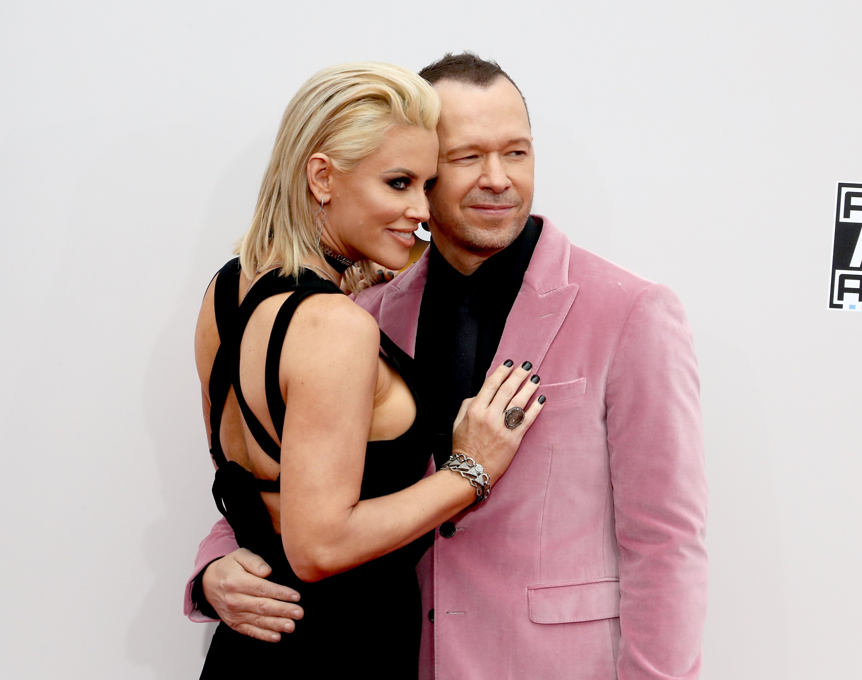 Image Credit: Getty Images/David Livingston | Jenny McCarthy and Donnie Wahlberg attend the 2016 American Music Awards