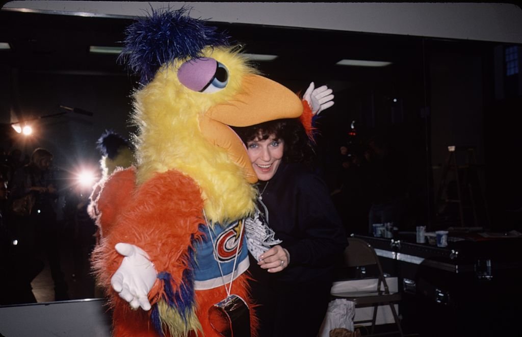 Image Credit: Getty Images / Loretta Lynn is pictured smiling in the 90s.
