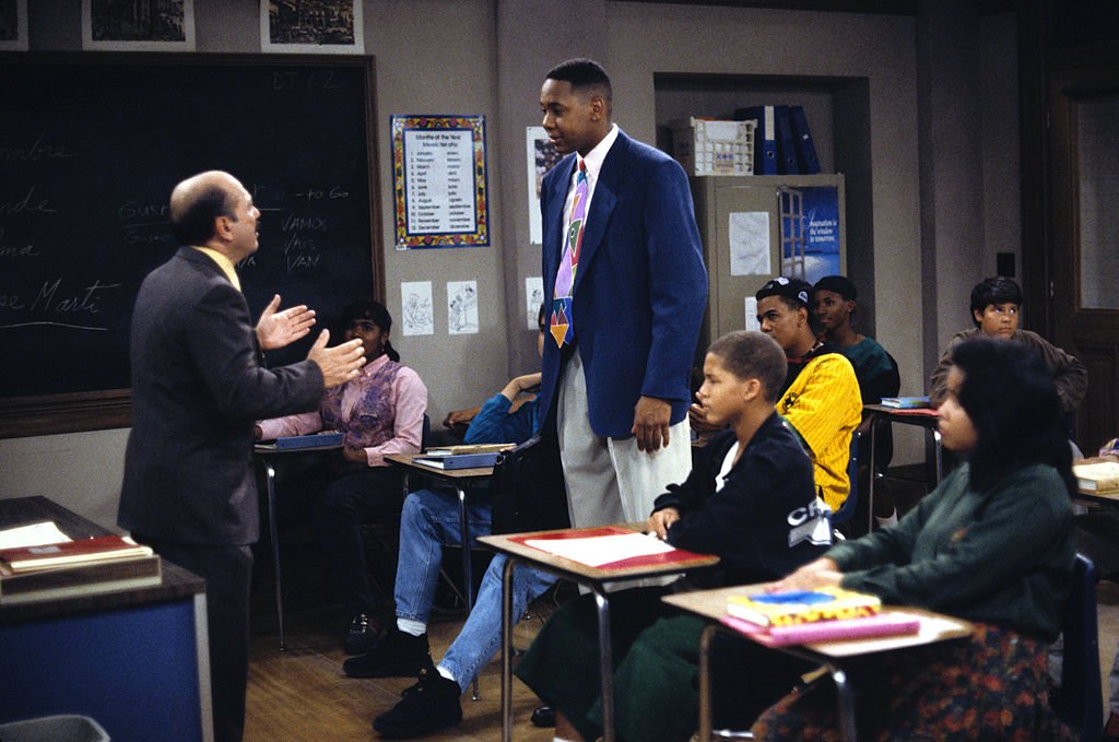 Image Credits: Getty Images / Walt Disney Television | Luis Avalos (as Principal Rivas) and Mark Curry (as Mr. Cooper) star in the T.V series "Hanging with Mr. Cooper." A single high school teacher and basketball coach living in Oakland, California. Image Credits: Getty Images / Walt Disney Television | Luis Avalos (as Principal Rivas) and Mark Curry (as Mr. Cooper) star in the T.V series "Hanging with Mr. Cooper." A single high school teacher and basketball coach living in Oakland, California.