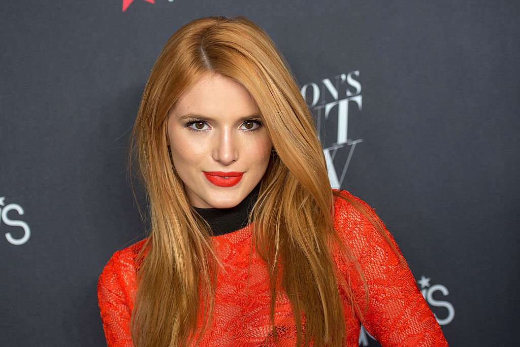 Image Credit: Getty Images / Actress and Disney star, Bella Thorne poses for a picture on the red carpet.