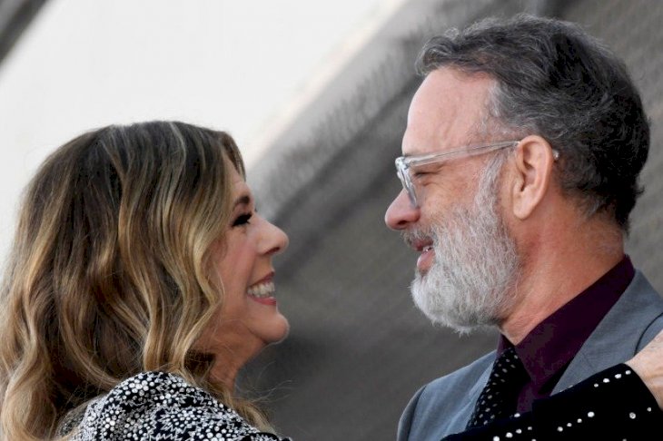 Image Credits: Getty Images / Frazer Harrison | Rita Wilson and Tom Hanks embrace as Wilson is honored with a star on the Hollywood Walk of Fame on March 29, 2019 in Hollywood, California.