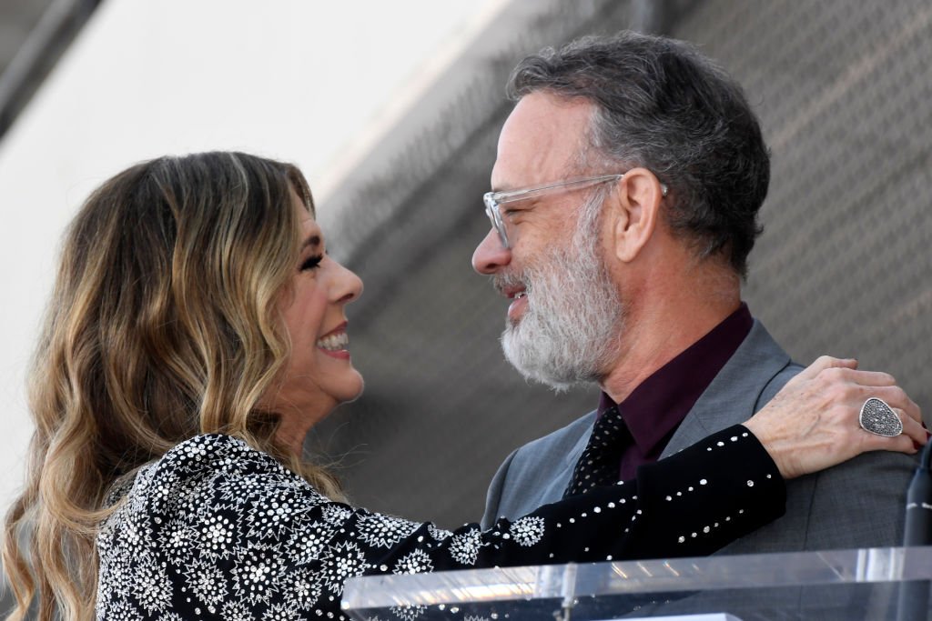 Image Credits: Getty Images / Frazer Harrison | Rita Wilson and Tom Hanks embrace as Wilson is honored with a star on the Hollywood Walk of Fame on March 29, 2019 in Hollywood, California.