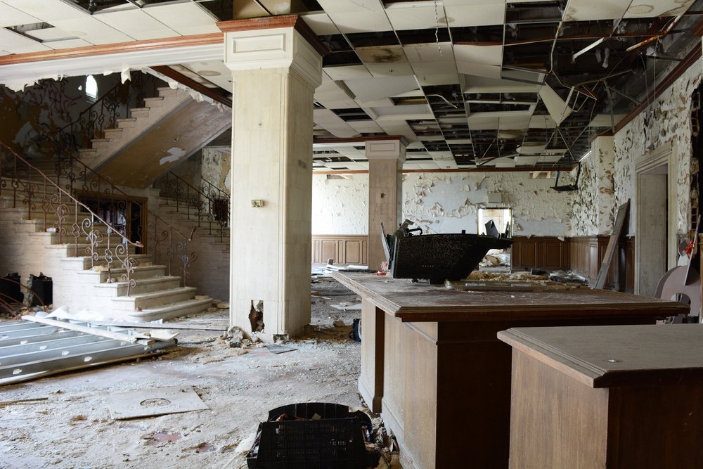 Lobby of Abandoned Office Building In Detroit | Shutterstock Lobby of Abandoned Office Building In Detroit | Shutterstock