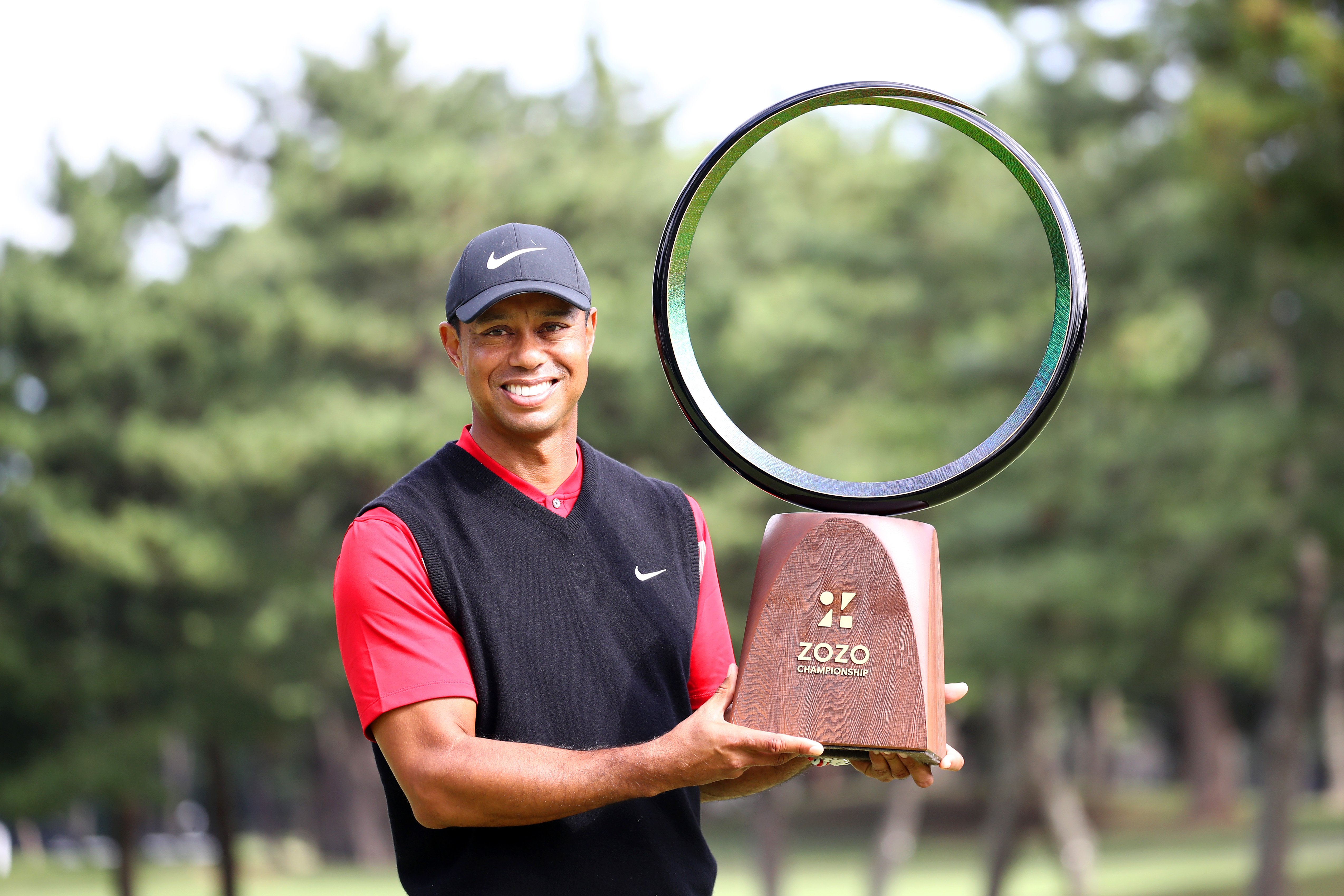 Image Credits: Getty Images / Chung Sung-Jun | Tiger Woods of the United States poses with the trophy after the award ceremony following the final round of the Zozo Championship at Accordia Golf Narashino Country Club on October 28, 2019 in Inzai, Chiba, Japan. Image Credits: Getty Images / Chung Sung-Jun | Tiger Woods of the United States poses with the trophy after the award ceremony following the final round of the Zozo Championship at Accordia Golf Narashino Country Club on October 28, 2019 in Inzai, Chiba, Japan.