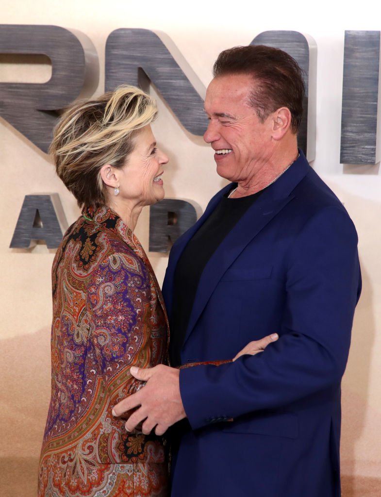 Image Credits: Getty Images / Mike Marsland / WireImage | Linda Hamilton and Arnold Schwarzenegger attend the "Terminator: Dark Fate" photocall on October 17, 2019 in London, England.