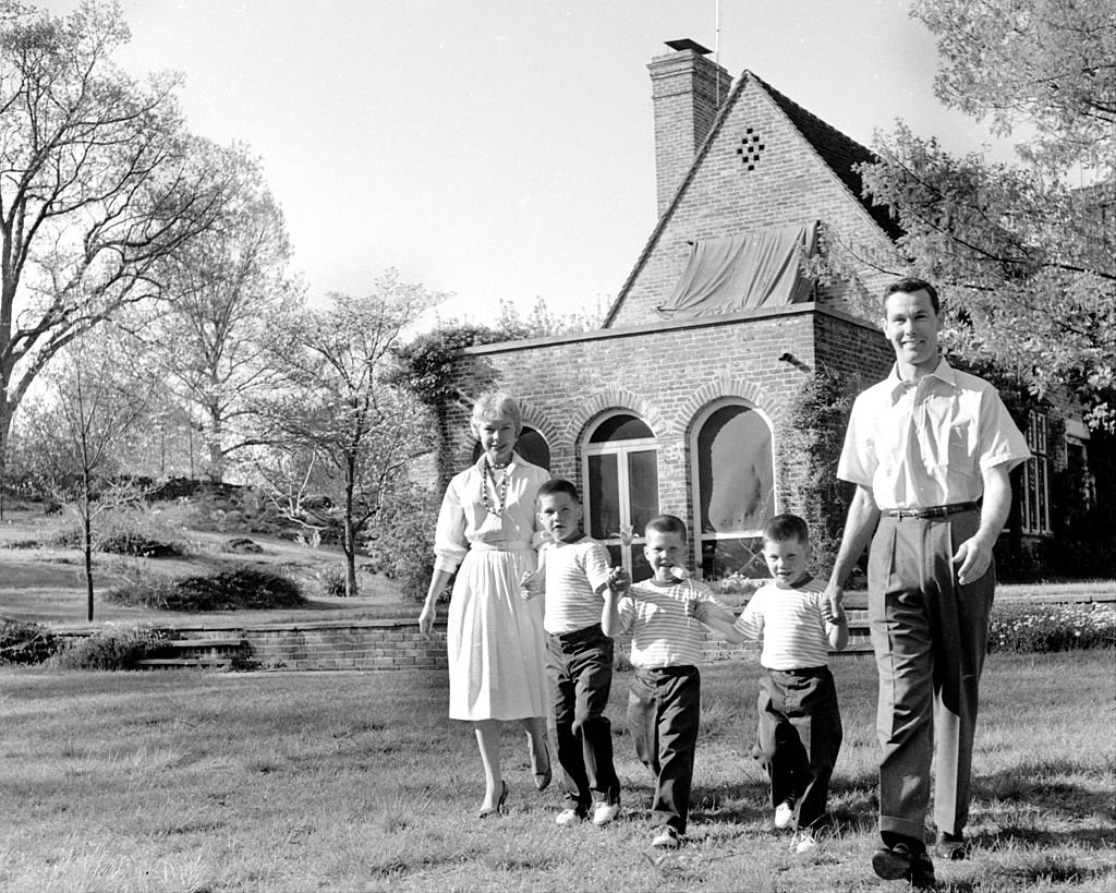 Image Credits: Getty Images / NY Daily News Archive | Johnny and his wife, Jody, with their sons, Kit, 7, Ricky, 6, and Cory, 4, walking around their almost 4 acres of land.