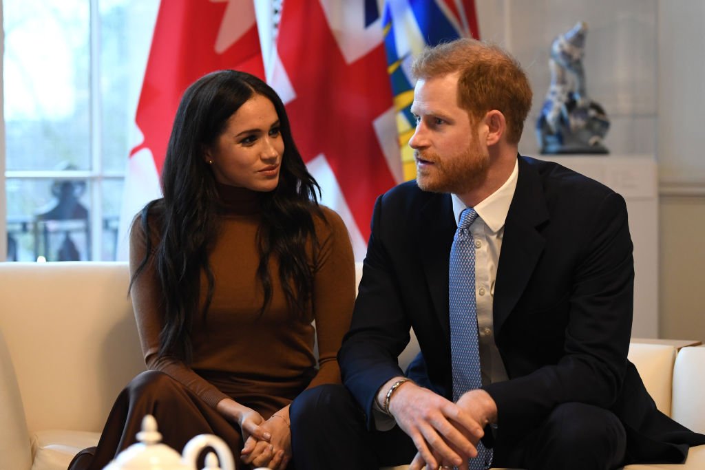 Image Credit: Getty Images / Prince Harry, Duke of Sussex and Meghan, Duchess of Sussex gesture during their visit to Canada House on January 7, 2020 in London, England.