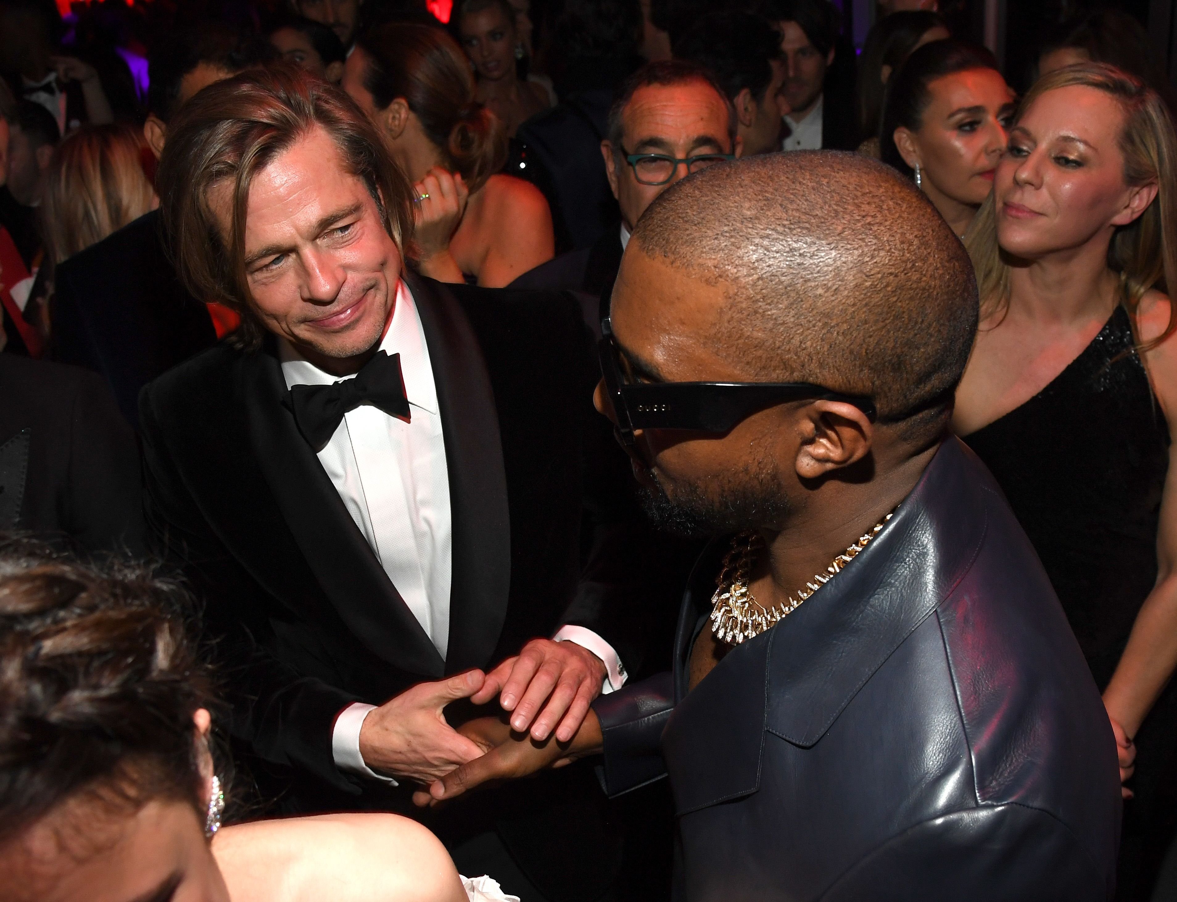 Brad Pitt and Kanye West / Getty Images Brad Pitt and Kanye West / Getty Images