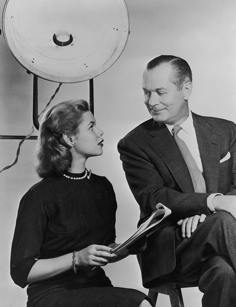 Image Credits: Getty Images / Archive Photos | American actor Robert Montgomery (1904 - 1981) on a film set with his daughter, actress Elizabeth Montgomery (1933 - 1995), circa 1960. Image Credits: Getty Images / Archive Photos | American actor Robert Montgomery (1904 - 1981) on a film set with his daughter, actress Elizabeth Montgomery (1933 - 1995), circa 1960.