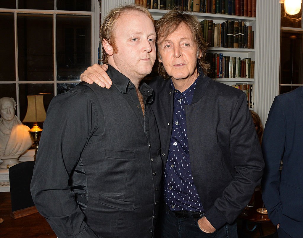 Image Credits: Getty Images / David M. Benett | James McCartney (L) and Sir Paul McCartney attend The London 2014 Stella McCartney Green Carpet Collection during London Fashion Week at The Royal British Institute on September 14, 2014 in London, England.